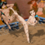 Jasmine and Belle fight in the mud pit